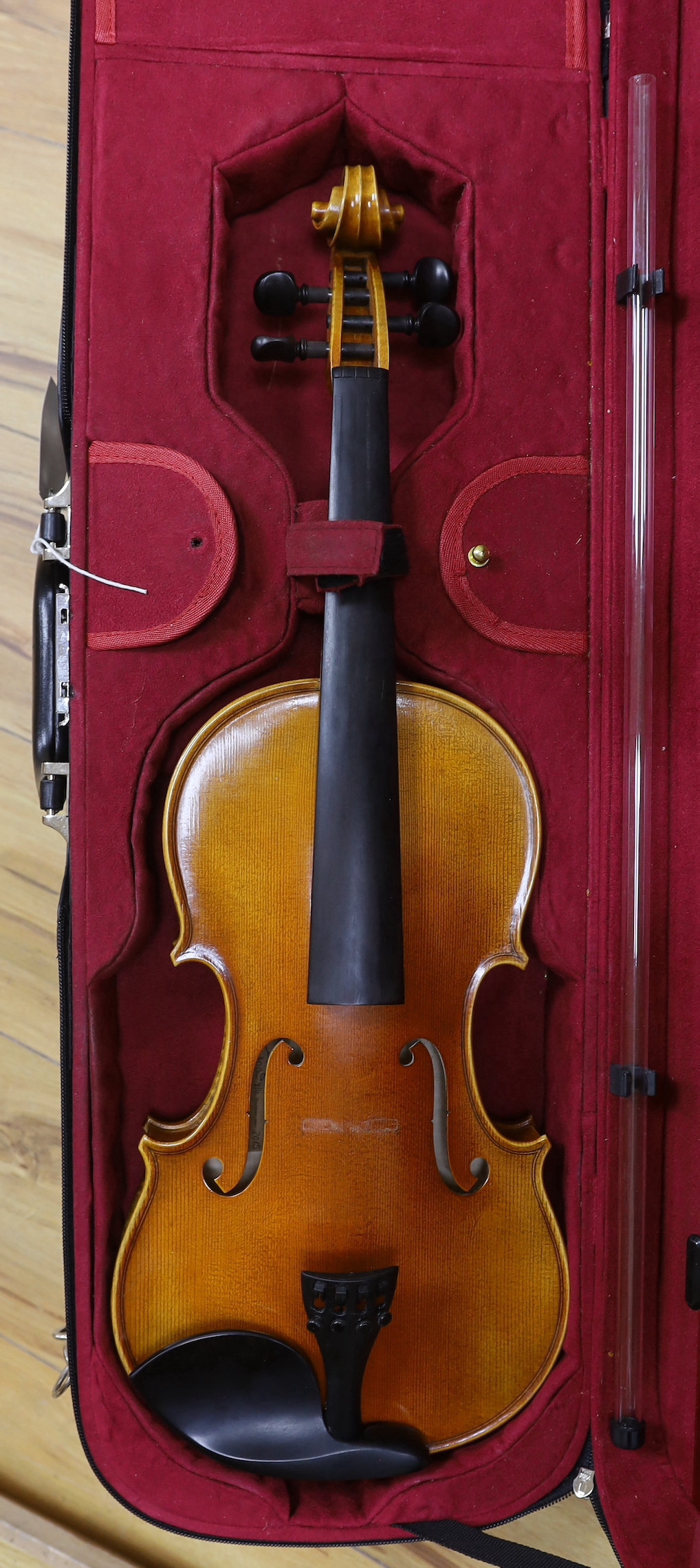 A cased German violin